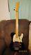 2006 squire telecaster bass guitar, black with Paisleys and Hipshot mini tuners