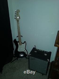 Bass Guitar, amplifier, tuner and cable