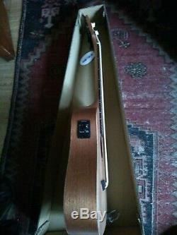 Electro acoustic Bass ukulele with built in tuner