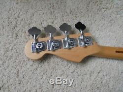 Fender Jazz Bass 4 string electric guitar, withExtra's, case, tuner, strap, & cord