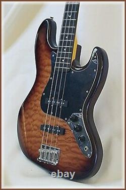 J bass deluxe with quilt maple top by Dillion + Fender AG 6 tuner FREE