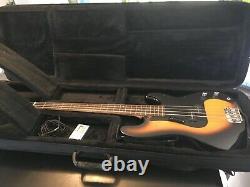 Silvertone Bass Guitar with deluxe case, strap, tuner, cord