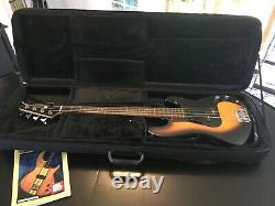 Silvertone Bass Guitar with deluxe case, strap, tuner, cord