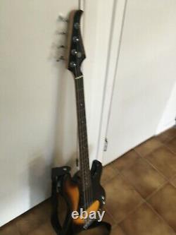 Silvertone Bass Guitar with deluxe case, strap, tuner, cord