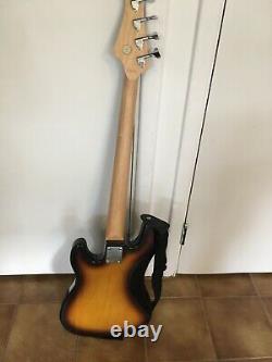 Silvertone Bass Guitar with deluxe case, strap, tuner, cord