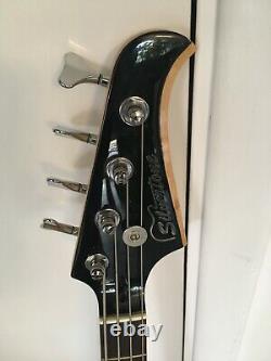 Silvertone Bass Guitar with deluxe case, strap, tuner, cord