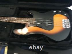 Silvertone Bass Guitar with deluxe case, strap, tuner, cord